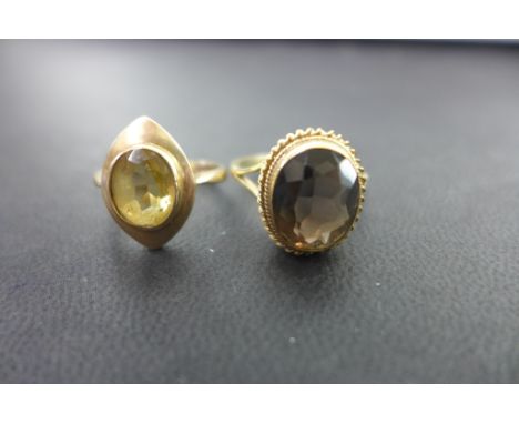 Two 9ct gold single-stone rings - To include citrine and smokey quartz - Hallmarked Birmingham - Ring sizes M and Q - Total w