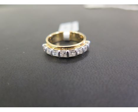 A 9ct gold princess-cut diamond eight-stone ring - Accompanied by SGL certificate no SGLJL7140B  stating the estimated diamon