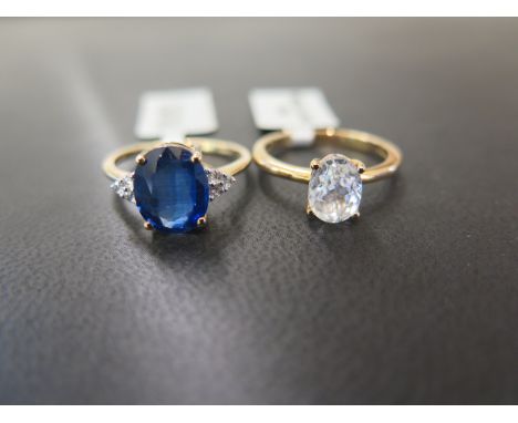 A 9ct gold zircon single-stone ring - Size N 1/2 - Together with a 9ct gold kyanite and diamond dress ring - Size N 1/2 - Hal