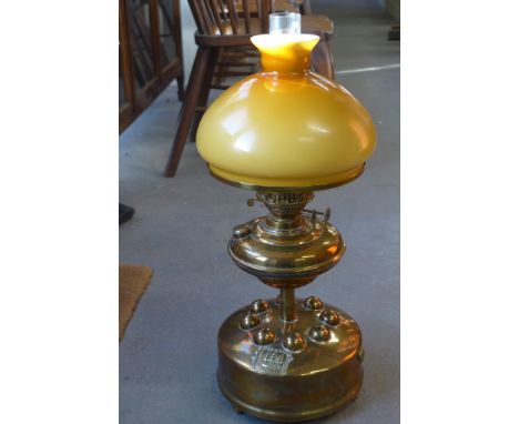 A late 19th century Swedish brass circular oil lamp by Hjorth with glass shade and chimney - Height 60cm 
Condition report: N