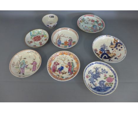 A collection of 18th and 19th century Chinese saucers together with a famille rose tea bowl decorated with figures (8 pieces)