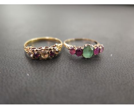 Two multi-gem set rings - One tests as higher carat gold - Size O - Weight approx 2.3gms - One tests as 9ct gold - Ring size 