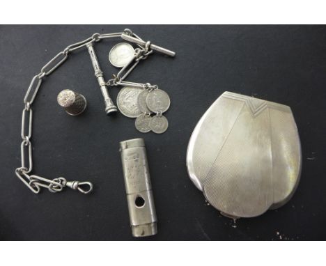 A selection of silver items, an Art Deco compact, watch chain with coins, a thimble and a silver vesta cheroot cutter - total