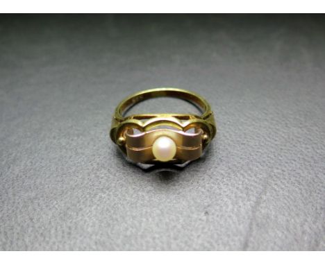 A cultured pearl dress ring - With marks indicating 14ct gold - Ring size P - Weight approx 3.4gms
Condition Report: Good