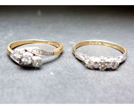 Two diamond three-stone rings - Stamped 18ct and plat - Ring size P 1/2 - Weight approx 4.9gms
Condition Report: Good - With 