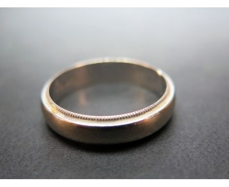 A band ring with mille grain edge - Stamped 14K - Ring size U 1/2 - Weight approx 5.8gms
Condition Report: Fair - With light 