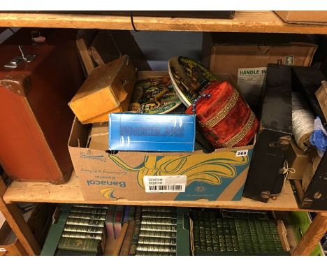 Shelf of assorted, binoculars, suitcase etc,