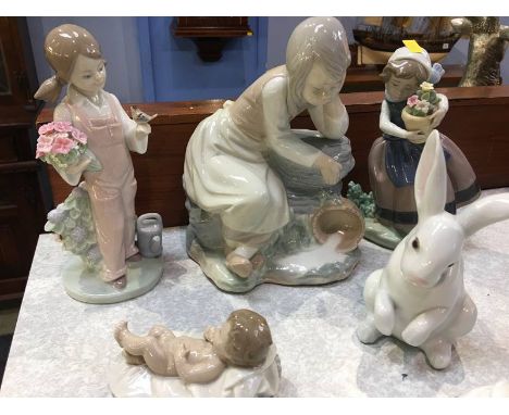 Five Lladro and Nao figures