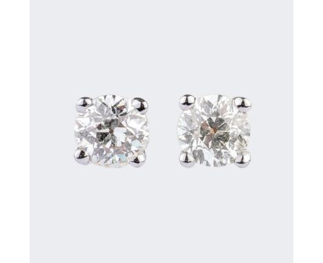 Paar Solitär-Ohrstecker. 18 kt. WG, gest. Krappengefasste Solitäre im Brillant-Schliff zus. ca. 1 ct. Leicht Getöntes Weiß(J)