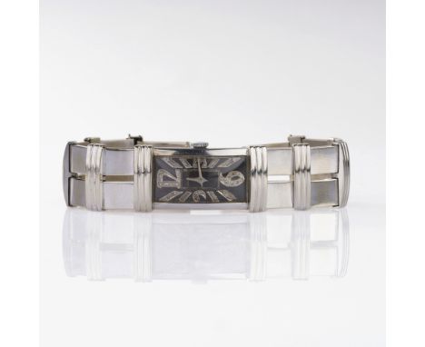Longines. Vintage Damen-Armbanduhr 'Curvex'. Um 1930. Platin, gest. Irid.Plat., 14 kt. Gold rhodiniert, Handaufzug. Schwarzes