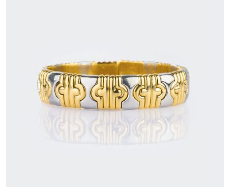 Bulgari. Armreif 'Parentesi'. 18 kt. GG und Edelstahl, gest., Bvlg, Or et Acier, Made in Italy. Geometrisches Parentesi Muste