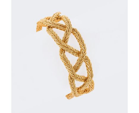 Cartier. Vintage Gold-Armband. Um 1960/70. 18 kt. GG, gest., gemarkt 'Cartier Italy', num. 55866. Einzelne geflochtene Kordel