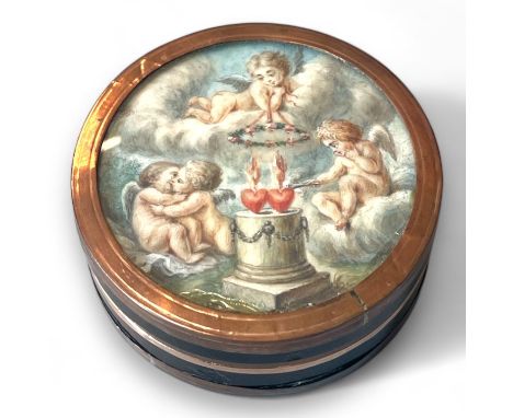 A 19th Century circular tortoiseshell snuff box with rose metal mounts. Top inset with watercolour scene pf cherubs/cupid. Ap