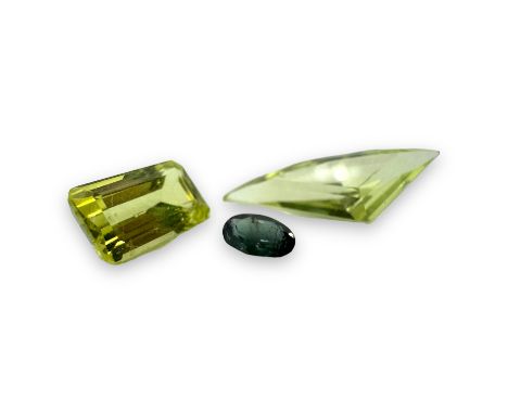 A parcel of chrysoberyl to include faceted, cabochon and rough examples. Featuring a 0.20 carat Alexandrite oval mixed cut st