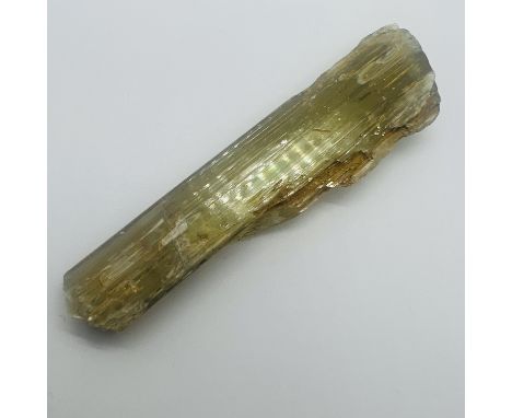 A bladed crystal of diaspore. Measuring approximately 80mm in length. Some apparent colour shift/change under incandescent li
