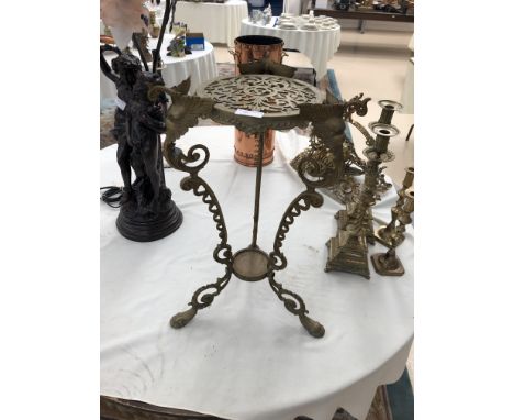 A brass jardiniere stand