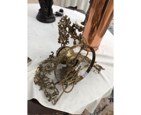 A ceiling hanging oiil lamp converted to electric