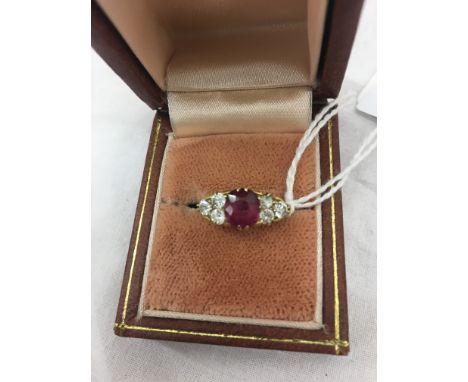 An 18ct diamond and ruby ring