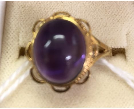 A 9ct cabochon amethyst dress ring