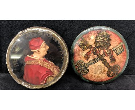 A cased waxed relief portrait of Pope Benedict XIII (1649 - 1730), surmounted by the inscription "BENEDICTVS - XIII - PONT - 
