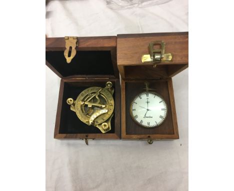 A boxed globe desk clock; together with a boxed compass