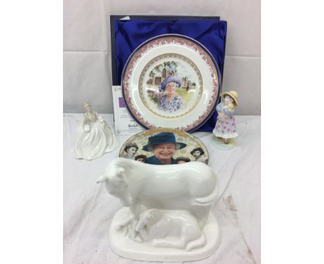 A Royal Doulton horse and foal; together with Coalport figurines and two Royal plates