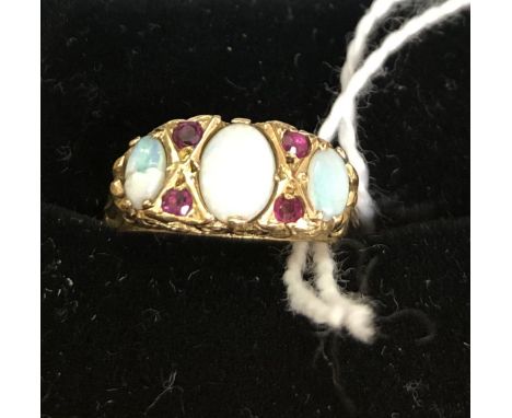 A 9ct opal and ruby dress ring