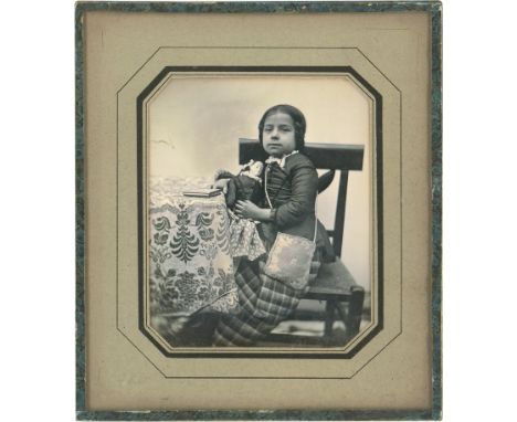 Daguerreotypes -- (Most probably from a Berlin studio). Portrait of a girl and her doll. Late1840s. Sixth-plate daguerreotype