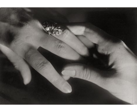 [*] Reidt, Hedda -- Hands with ring. Circa 1925. Vintage gelatin silver print mounted to board (lifting off of mount). 12 x 1