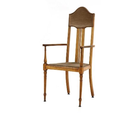 An Edwardian armchair, the artist's studio chair of portrait painter Michael Noakes, early 20th Century, signed to the unders