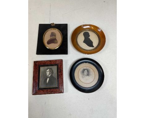 Two 19th century portrait silhouettes, both framed and glazed, and three further miniature prints, a frame, and a further pri