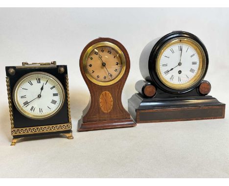 A late 19th century simulated black slate mantel clock, an Edwardian balloon clock, and a further small mantel clock (3)