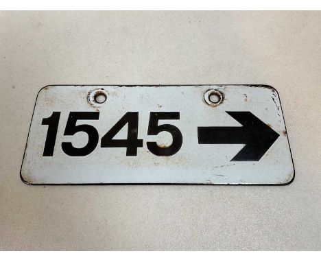 A vintage railway enamel sign '1545' with an arrow, 27 x 11.5cm.