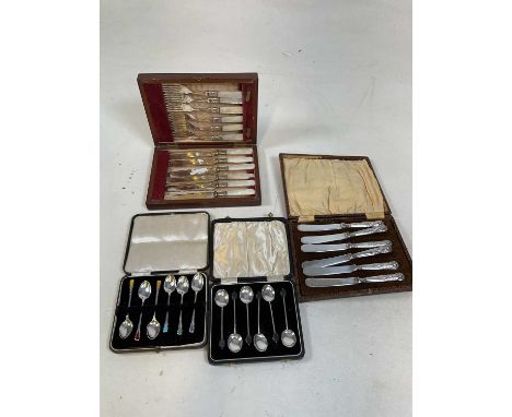 DEAKIN &amp; FRANCIS; a cased set of six hallmarked silver and coloured enamel decorated coffee spoons, Birmingham 1938, a ca