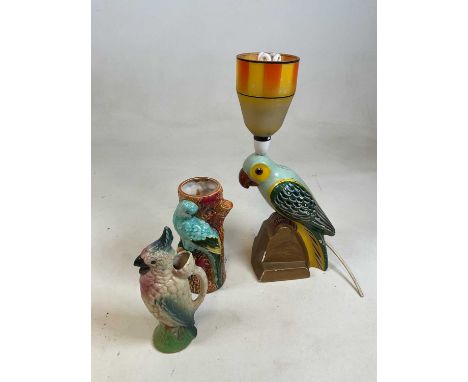 A parrot decorated vase, a jug, and a parrot lamp (3).