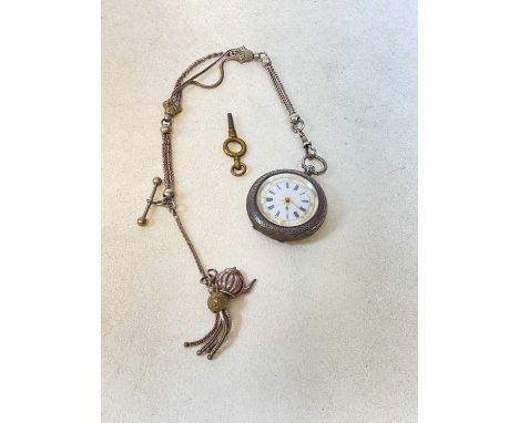 A circa 1900 key wind silver fob watch with Roman numerals to the enamel dial and with triple strand fob chain.
