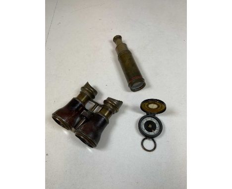 A small seven draw brass telescope, length when closed 12cm, a pair of field glasses and a pocket compass (3).
