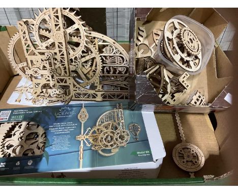 UGEARS; a kit to build a model aero wall clock with pendulum.