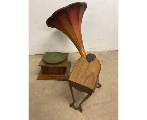 A pair of bellows and a gramophone with large tin horn also with a vintage telephone and vinly records. (78's)