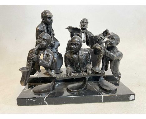 UNATTRIBUTED; a bronze group of five musicians, mounted on a stepped black marble base, 30 x 20cm. 