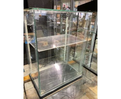 SEAL; a vintage glazed display cabinet with sliding rear door, height 62cm, width 45cm.