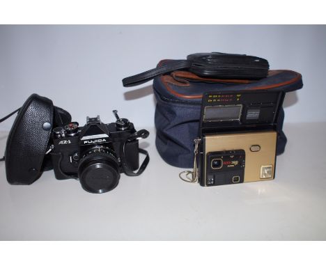 Vintage Kodak Disc 8000 Camera together with Fujica Vintage Camera 