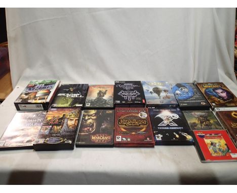Fifteen Pc games, including Lord of the Rings, Warcraft etc. UK P&amp;P Group 1 (£16+VAT for the first lot and £2+VAT for sub