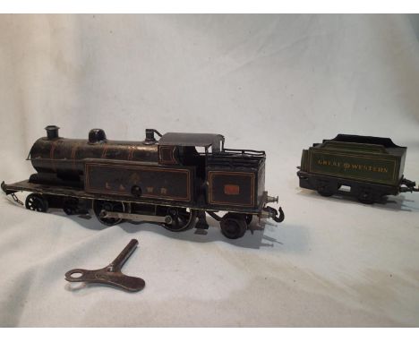 Bassett Lowke O gauge clockwork precursor tank, black, 44, LNWR livery, original condition, working with key, plus Bing O gau