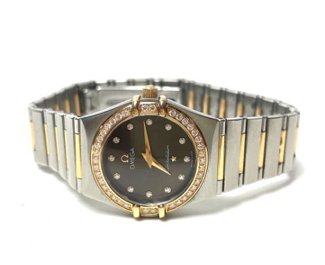 OMEGA Constellation Damenarmbanduhr, Ref.-Nr. 90647849, Stahl / Gold, Quartz, Lünette mit Brillanten gefasst, Indexe mit Diam