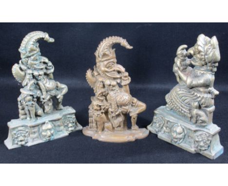 VINTAGE CAST BRASS PUNCH &amp; JUDY DOORSTOPS along with one other later Punch example, 31cms H