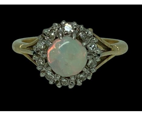 18CT GOLD OPAL &amp; DIAMOND RING SIZE M - 4.2grms, the central opal surrounded by 10 diamonds in an open shouldered mount st