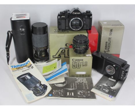 CANNON A1 SLR CAMERA BODY and associated equipment, No 1429361 with original warranty card and instruction book, purchase dat