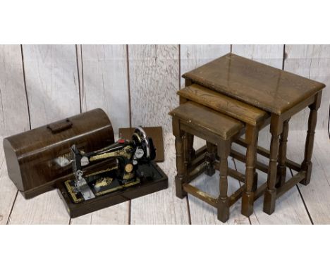 VINTAGE SINGER HAND CRANK SEWING MACHINE in a case and a reproduction oak set of three occasional tables, 49cms H, 48cms W, 3