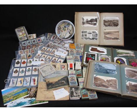 VINTAGE POST &amp; CIGARETTE CARDS, contained in three albums and loose, approximately two hundred and sixty postcards to inc